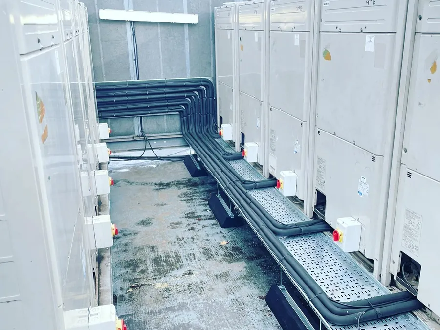 VRV re-pipe &mdash; Re-pipe of 14no. existing VRV systems to enable access for a roof replacement. New pipework, lagging and inter