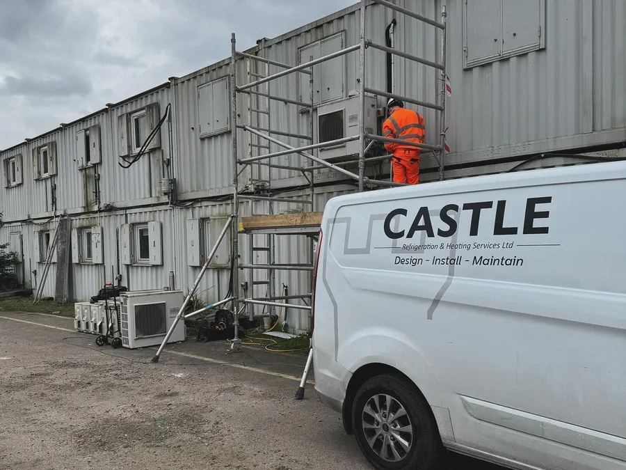 Castle M&E vans on site at a housing project